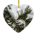 Snow on Evergreen Branches Ceramic Ornament