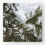 Snow on Evergreen Branches Square Wall Clock