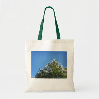 Snow-tipped Pine Tree on Blue Sky Tote Bag