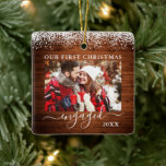 Snow Top Wood Our First Christmas Engaged Photo Ceramic Ornament<br><div class="desc">Snow Topped Our First Christmas Engaged Double Sided Photo Ornament - Front & Back Photos,  Names on Back - Rustic Country Wood</div>