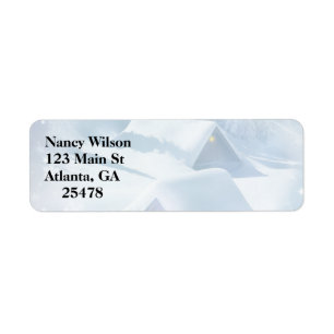 Snow topped roof in a forest label