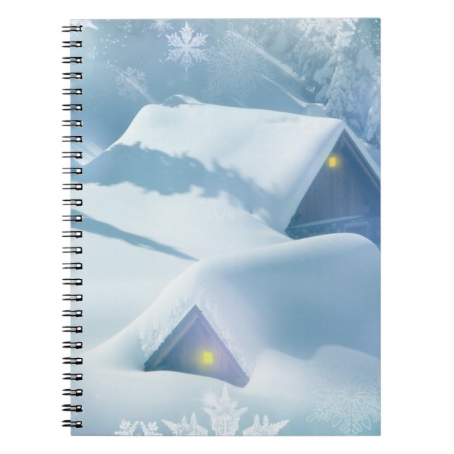 Snow topped roof in a forest notebook (Front)