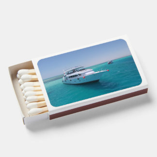 Snow-white yacht near the White Island in Red Sea Matchboxes