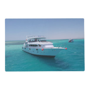 Snow-white yacht near the White Island in Red Sea Placemat