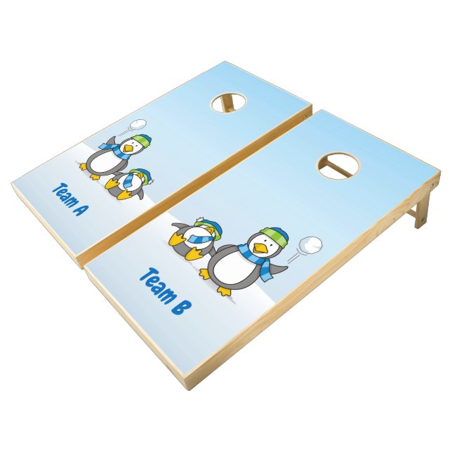 Snowballing penguins cornhole set (Angled)