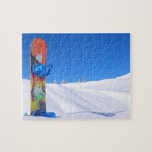Snowboard in Snow on Bluebird Day Jigsaw Puzzle (Horizontal)