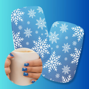 Snowcrystal and ice on a blue gradient background minx nail art