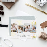 Snowdrop 4 Photo Collage Merry Christmas Foil Holiday Card<br><div class="desc">Unique modern holiday card design features four favorite photos arranged side by side with oversized gold foil snowflake silhouettes in the background. Personalize with your custom holiday greeting and family name(s) beneath in classic lettering; shown with "Merry Christmas."</div>
