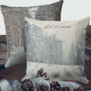 Snowfall in the winter forest throw pillow