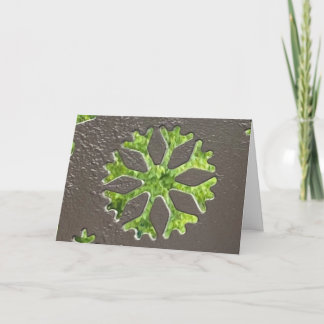 Snowflake cut into steel card