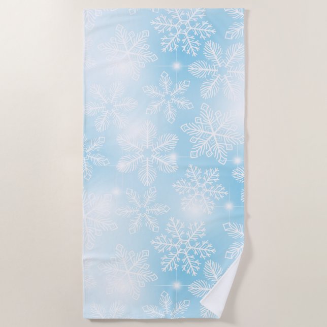 Snowflakes and lights on blue beach towel (Front)