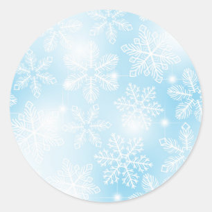 Snowflakes and lights on blue classic round sticker