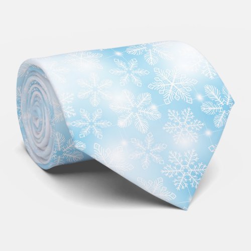Snowflakes and lights on blue neck tie