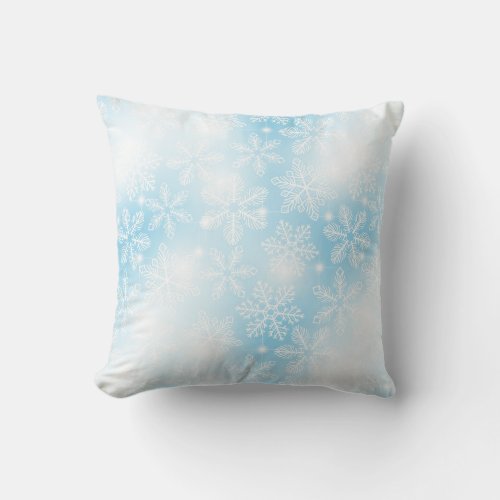 Snowflakes and lights on blue throw pillow