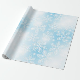 Snowflakes and lights on blue wrapping paper