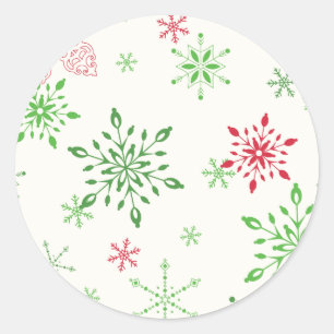Snowflakes in green and red classic round sticker