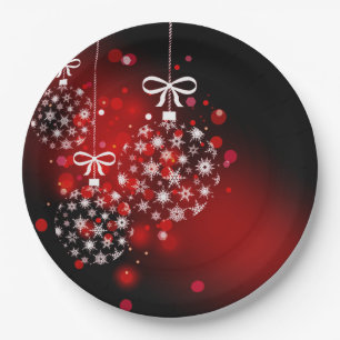 Snowflakes on a red and black background. paper plates