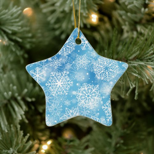 Snowflakes on blue ceramic ornament