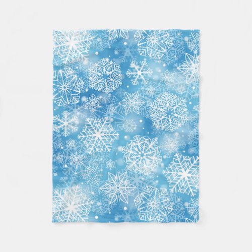 Snowflakes on blue fleece blanket