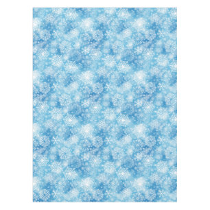 Snowflakes on blue tablecloth