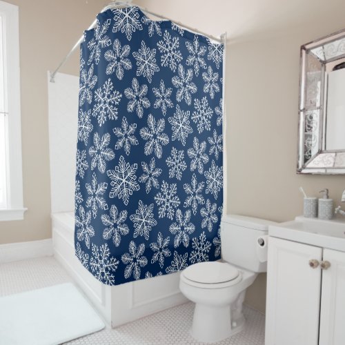 Snowflakes on dark blue shower curtain