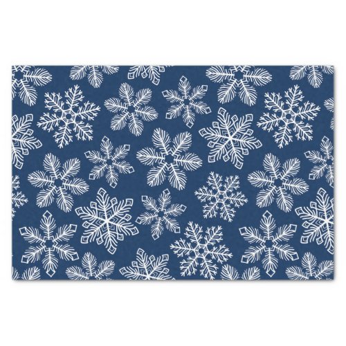 Snowflakes on dark blue tissue paper