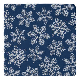 Snowflakes on dark blue trivet