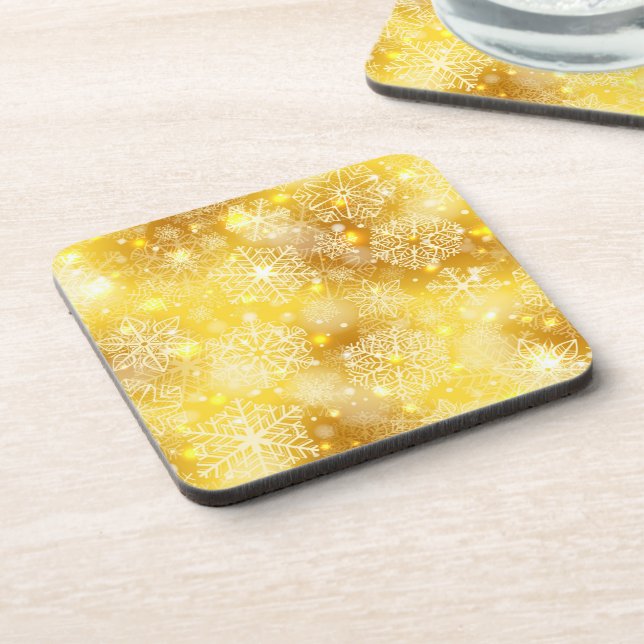Snowflakes on golden beverage coaster (Left Side)