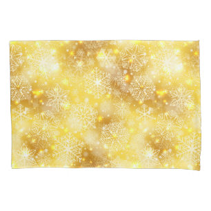 Snowflakes on golden pillow case