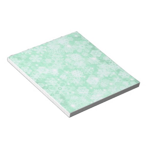 Snowflakes on Green Notepad