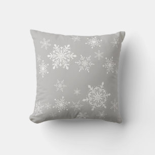 snowflakes on grey throw pillow