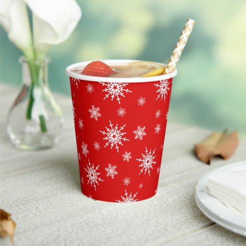 Snowflakes on holiday red paper cups