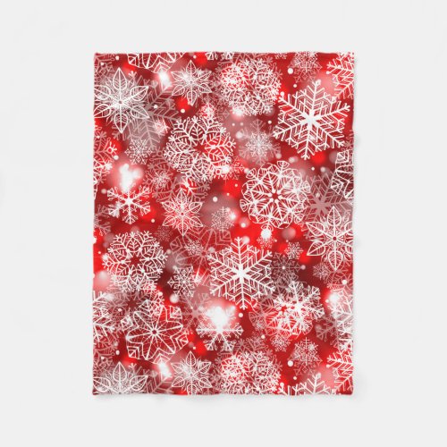 Snowflakes on red fleece blanket