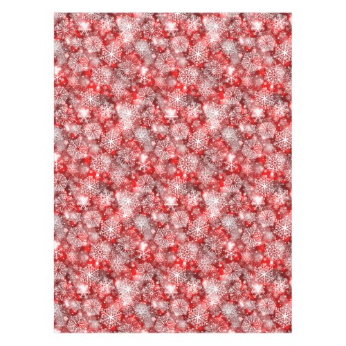 Snowflakes on red tablecloth