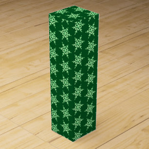 Snowflakes, pale green crystals on dark green wine gift box