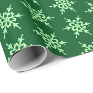 Snowflakes, pale green crystals on dark green wrapping paper