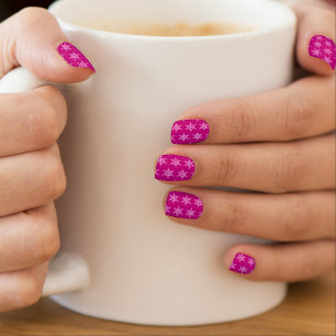 Snowflakes, pale pink crystals on magenta minx nail art