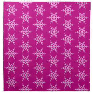 Snowflakes, pale pink crystals on magenta napkin