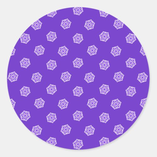 Snowflakes pattern on blue classic round sticker