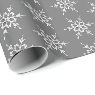 Snowflakes, silver crystals on charcoal grey wrapping paper