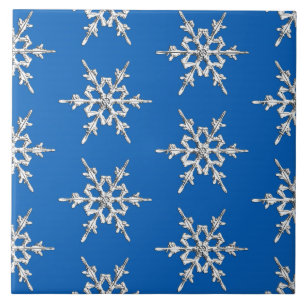 Snowflakes, silver crystals on cobalt blue ceramic tile
