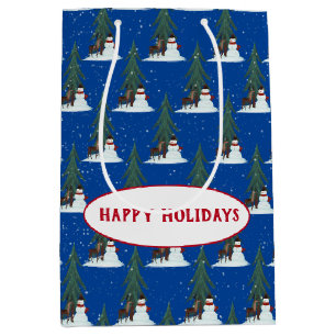 snowman and deer in snowflakes on blue medium gift bag