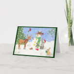 Snowman and Friends - Christmas Greeting Card<br><div class="desc">This snowman Christmas card features a very happy snowman sharing gifts with his friends the cat,  deer,  cardinals,  mouse and rabbit. It would make a nice Holiday Greeting for your family and friends.</div>