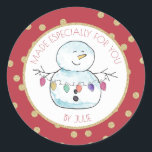Snowman and String Lights Classic Round Sticker<br><div class="desc">Festive red and gold "made especially for you " sticker featuring my lighthearted watercolor snowman holding a string of colorful holiday lights.  Personalize text as preferred.</div>