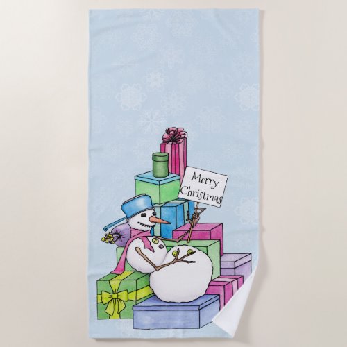 Snowman chilling on presents beach towel