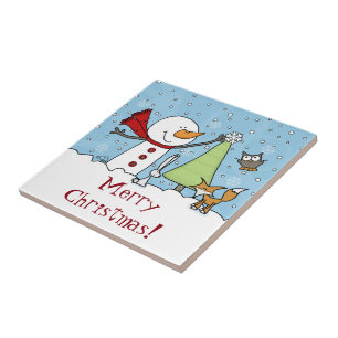 Snowman Decorates Tree with Woodland Creatures Ceramic Tile