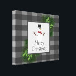 Snowman Gray Buffalo Plaid Canvas Print<br><div class="desc">Make your walls festive this holiday season with a Snowman Gray Buffalo Plaid Stretched Canvas Print.  Canvas print design features a box adorned with pine branches and charming snowman against a buffalo plaid background.  Additional gift and holiday items available with this design as well.</div>