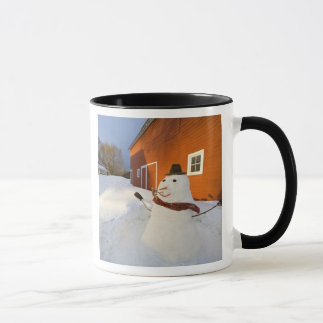 Snowman in front of red barn in Columbia Falls Mug (Right)