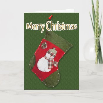 Snowman On Christmas Stocking Over Green Holiday Card by Exit178 at Zazzle