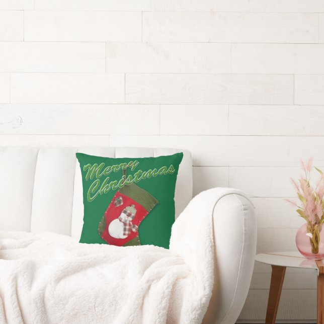 Snowman on Christmas Stocking Over Green Throw Pillow (Couch)